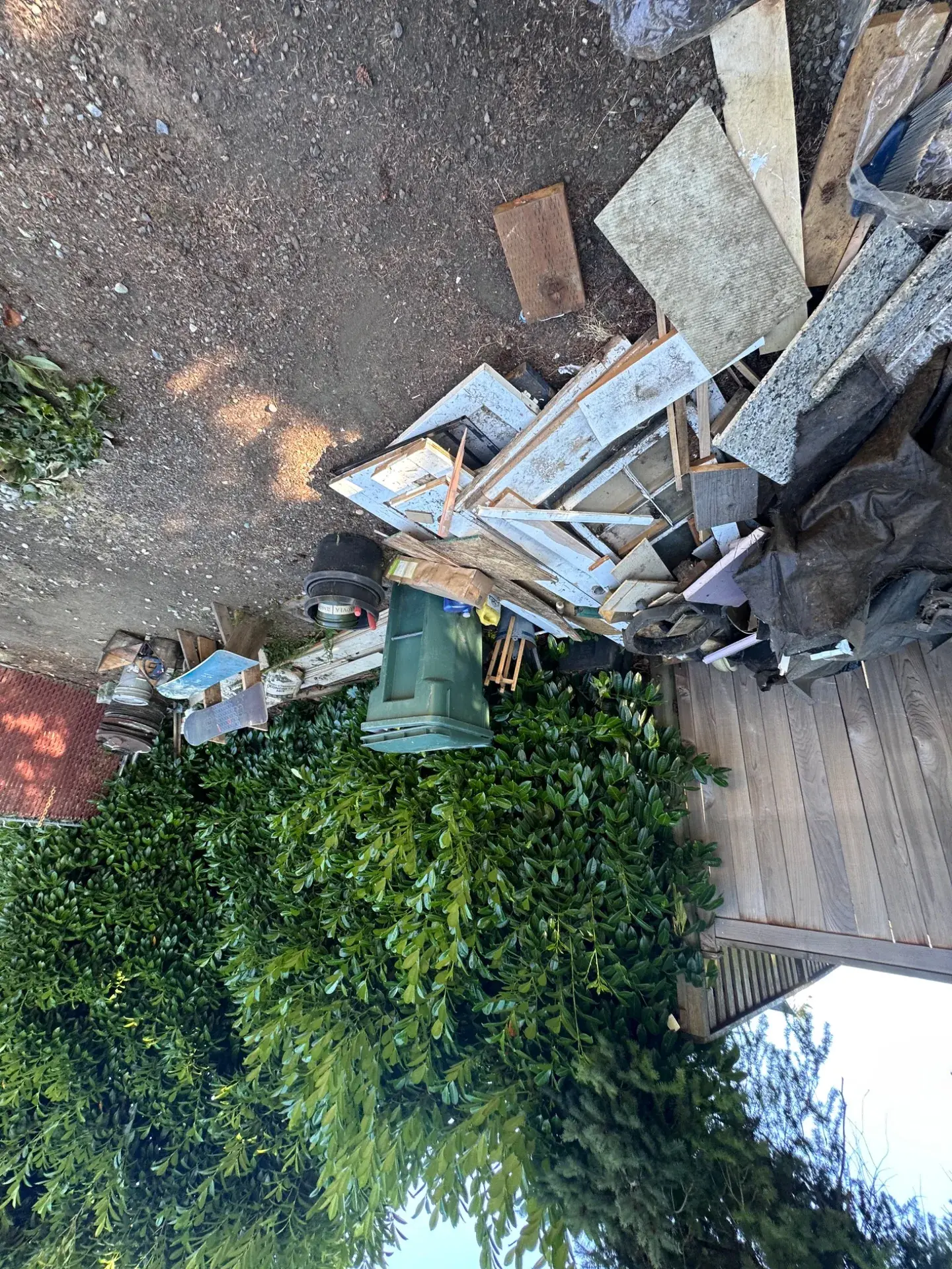 Demolition debris sorted into lumber, drywall and stone